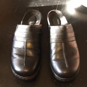 Clark’s black slip on clogs